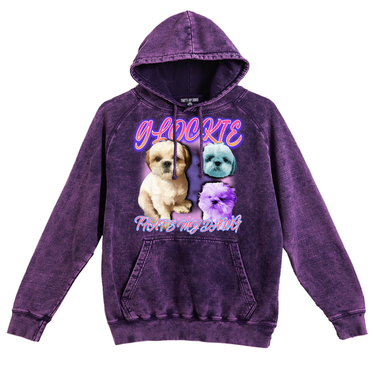 a purple hoodie with a picture of a dog on it