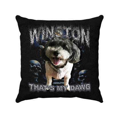 a black pillow with a picture of a dog on it