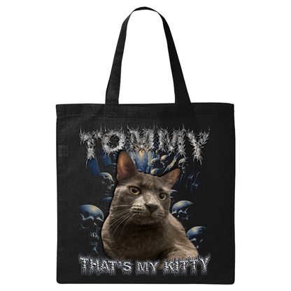 a black tote bag with a picture of a cat