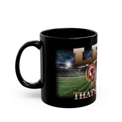 a black coffee mug with a picture of a football field