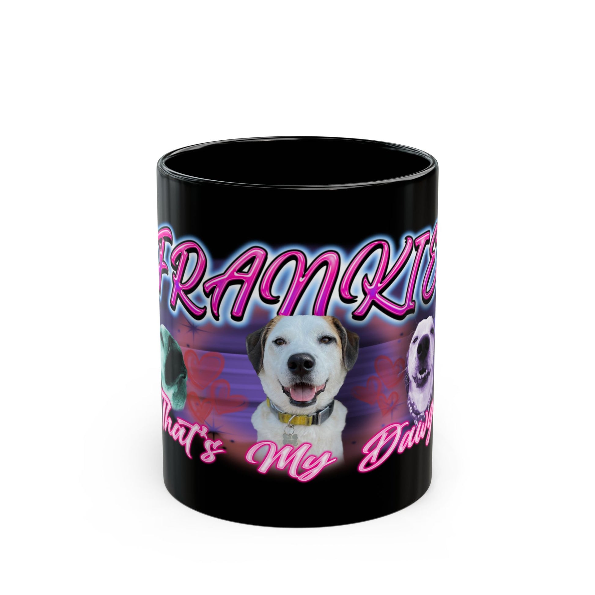 a black coffee mug with a picture of a dog