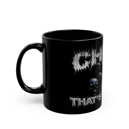 a black coffee mug with a skull on it