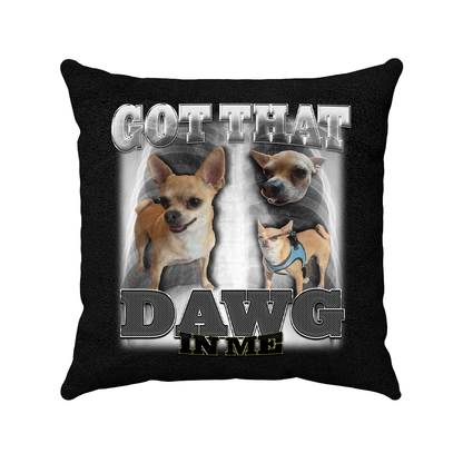 a black pillow with two dogs on it