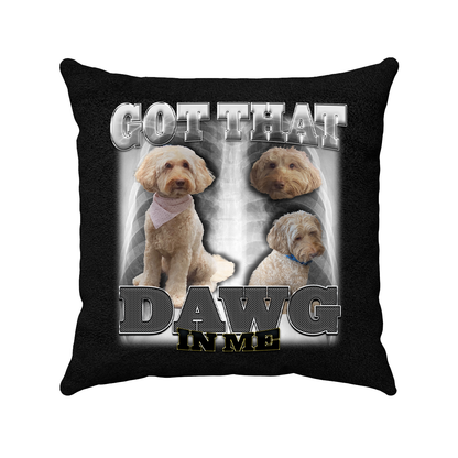 a black pillow with two dogs on it